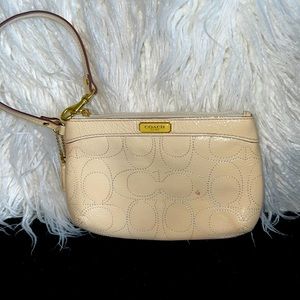 Small vintage coach clutch. Good condition. One small mark on front.